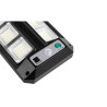 czarna lampa solarna LED z panelem i czujnikiem ruchu oraz pilotem