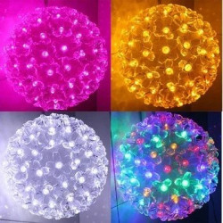 Niebieska kula świąteczna LED o średnicy 20 cm z 200 diodami LED i przezroczystymi kwiatowymi elementami