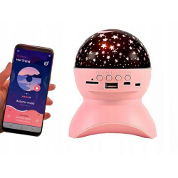 Różowy projektor gwiazd z efektem świetlnym i głośnikiem Bluetooth, z widocznymi portami USB i przyciskami