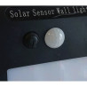 czarny kinkiet solarny z panelem LED i czujnikiem ruchu do montażu na ścianę