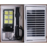 Latarnia solarna LED 1300W z panelem solarnym i mocowaniem na tle białym