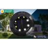 Zestaw 4 czarnych lamp solarnych wbijanych do ziemi z widocznym panelem i diodami LED