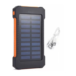 Power bank solarny czarno-pomarańczowy z panelem słonecznym i białym kablem USB