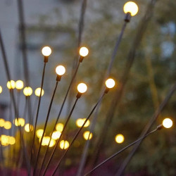 Dwie lampki solarne z 8 kolorowymi, świecącymi kulkami na metalowych prętach