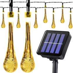 Girlanda solarna z podłużnymi kroplami LED na czarnym kablu i panel słoneczny