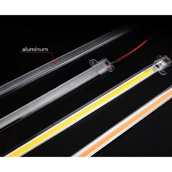 Listwa LED meblowa w aluminiowej osłonie, widoczny pasek diod COB i przewód zasilający
