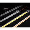 Listwa LED meblowa w aluminiowej osłonie, widoczny pasek diod COB i przewód zasilający