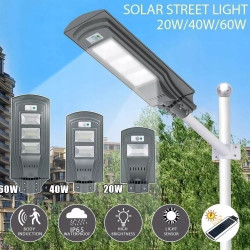Szara latarnia solarna na mocowaniu ściennym z panelem solarnym i wbudowanym czujnikiem ruchu