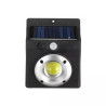 czarna lampa solarna ścienna z panelem solarnym, diodą LED COB i czujnikiem ruchu